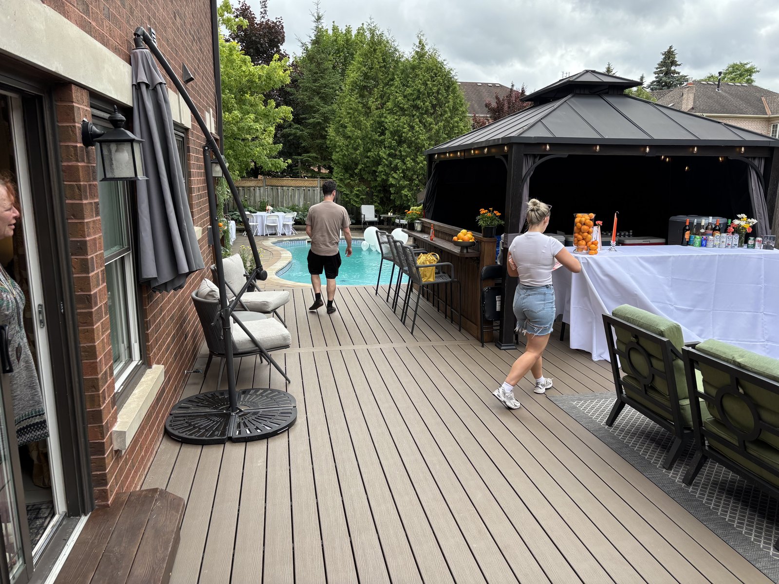 Backyard deck with hardtop gazebo and outdoor entertaining area